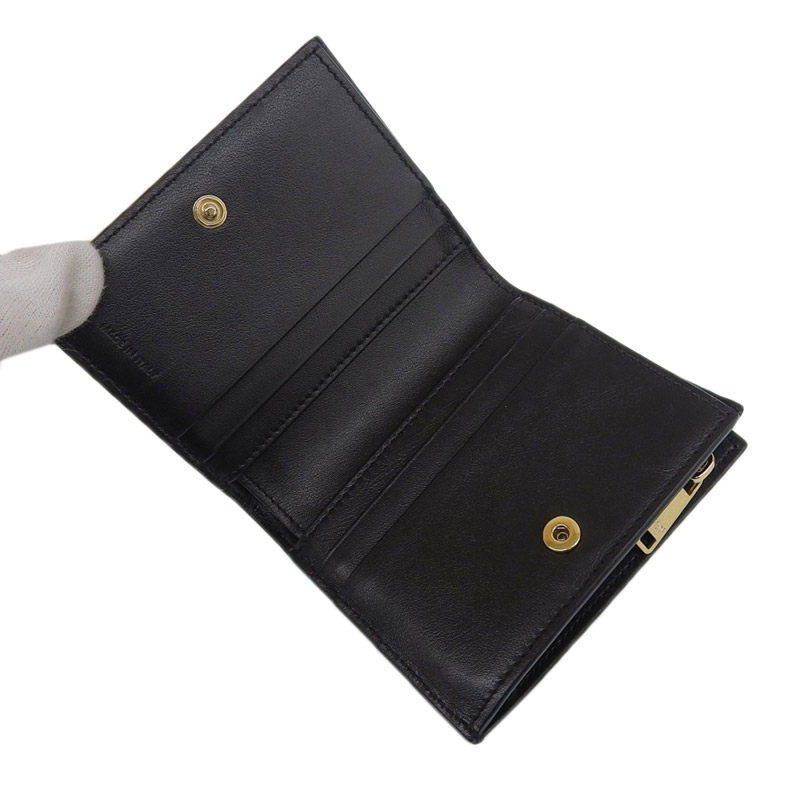 http://セリーヌ%20CELINE%20二つ折り財布%20コンパクトウォレット%20レザー%20ブラック%2010E493BEL38NO%20中古%20OBB0544