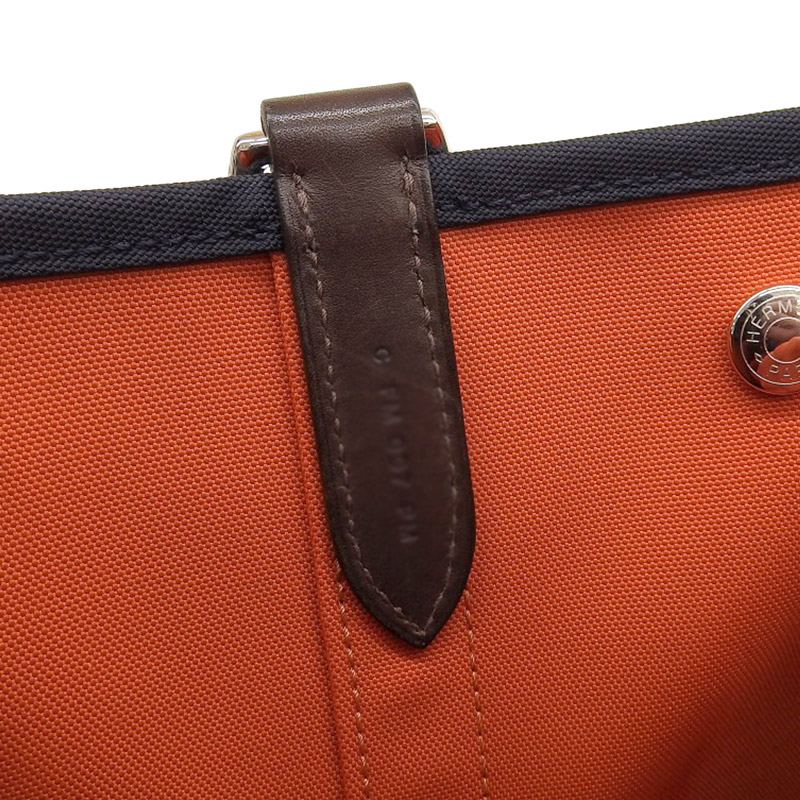 http://エルメス%20HERMES%20サックパンサージュ%202WAYバッグ%20キャンバス/レザー%20ネイビー/オレンジ%20C刻印%202018年%20中古%20HE0897