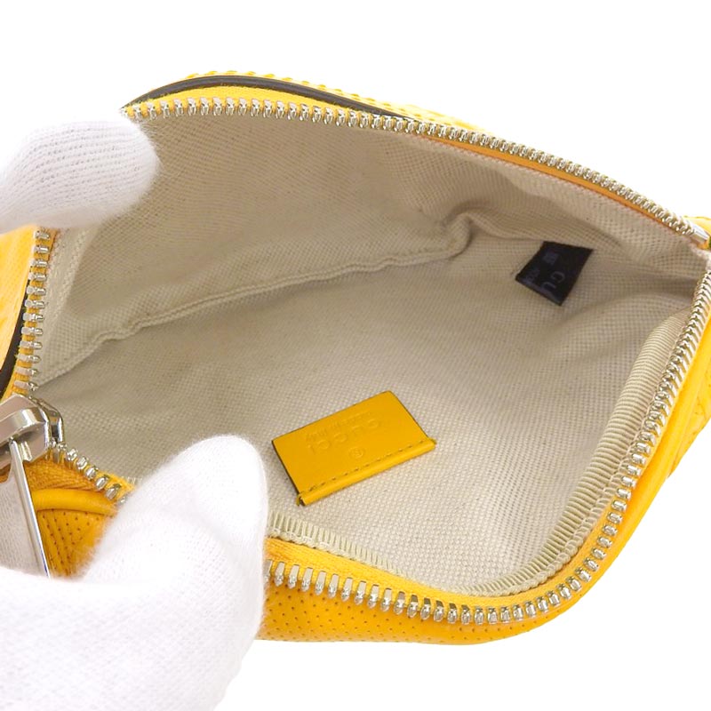 http://グッチ%20GUCCI%20GGエンボス%20ボディバッグ%20ベルトバッグ%20ウエストバッグ%20イエロー%20658582%20中古%20GU0565