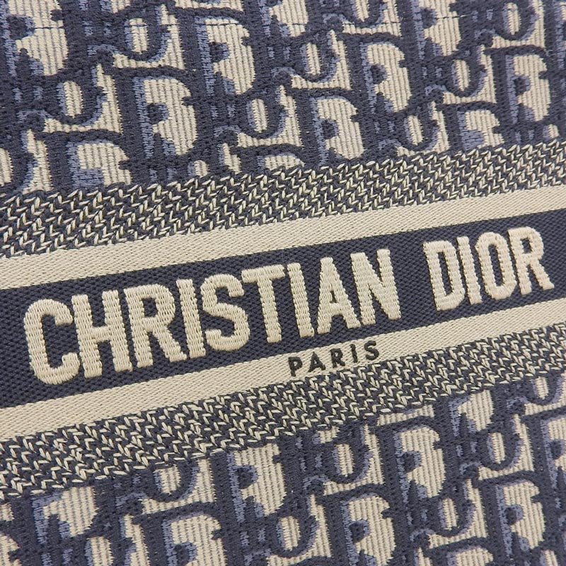 http://ディオール%20CHRISTIAN%20DIOR%20オブリーグ%20ブックトートスモール%20トートバッグ%20キャンバス%20ネイビー%20M1265ZRIW_M828%20中古%20OB1804