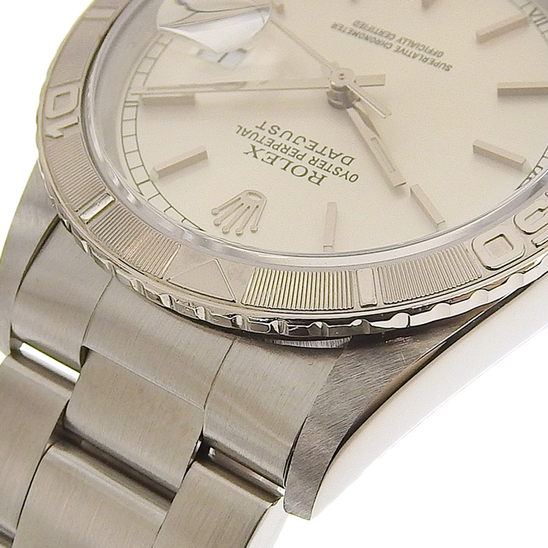 http://ロレックス%20ROLEX%20デイトジャスト%20サンダーバード%20メンズ%20自動巻き%20腕時計%20SS/WG%20シルバー文字盤%20Y番%202002年%2016264%20中古%20RO0269