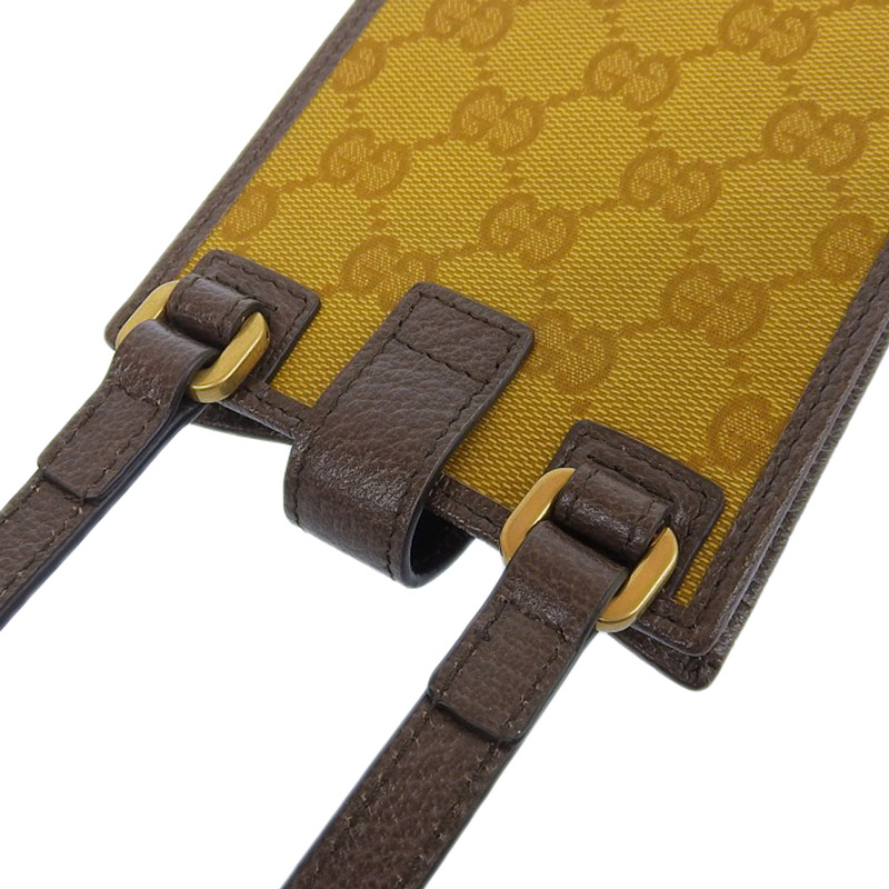 http://グッチ%20GUCCI%20アディダスコラボ%20GGクリスタル%20スマホショルダー%20PVC/レザー%20ブラウン/ホワイト%20702203%20美品%20GU0583