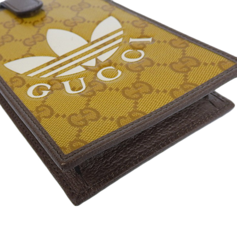 http://グッチ%20GUCCI%20アディダスコラボ%20GGクリスタル%20スマホショルダー%20PVC/レザー%20ブラウン/ホワイト%20702203%20美品%20GU0584