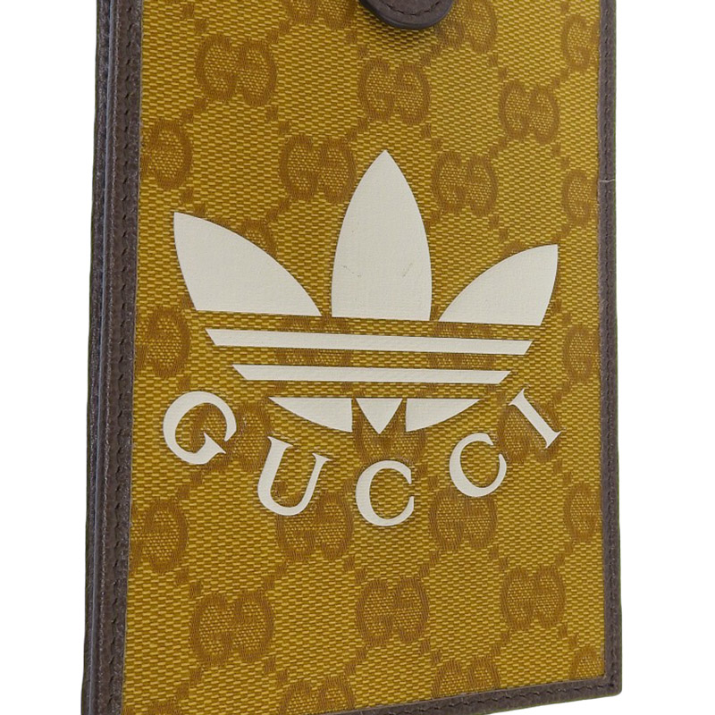 http://グッチ%20GUCCI%20アディダスコラボ%20GGクリスタル%20スマホショルダー%20PVC/レザー%20ブラウン/ホワイト%20702203%20美品%20GU0584