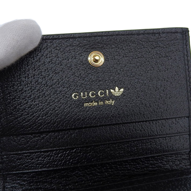 http://グッチ%20GUCCI%20アディダスコラボ%20ショルダーウォレット%20レザー%20ブラック/ホワイト%20702248%20美品%20GU0585