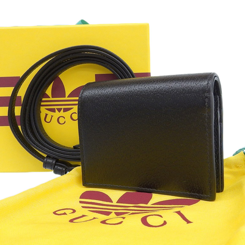 http://グッチ%20GUCCI%20アディダスコラボ%20ショルダーウォレット%20レザー%20ブラック/ホワイト%20702248%20美品%20GU0586