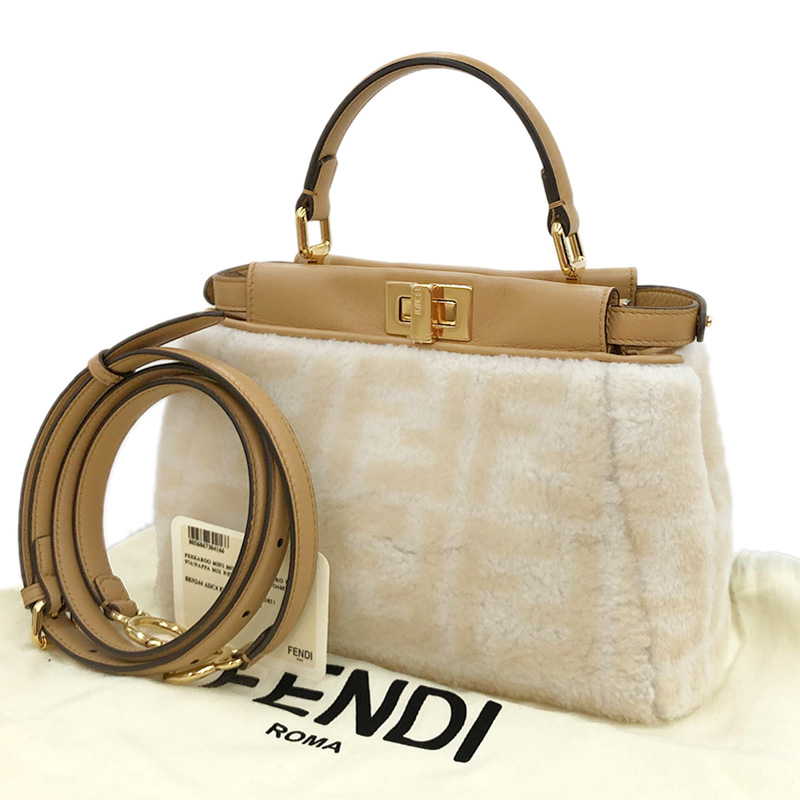 http://フェンディ%20FENDI%20ピーカブー%20ミニ%202WAYバッグ%20ハンドバッグ%20ショルダーバッグ%20レザー/ムートン%20ベージュ%208BN244%20中古%20OB1852