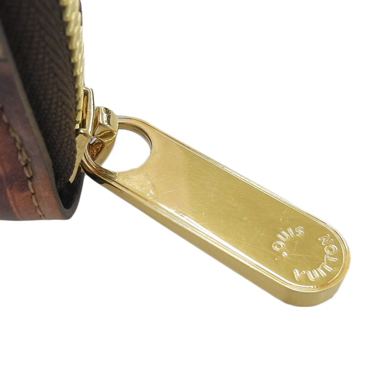 http://ルイヴィトン%20LOUIS%20VUITTON%20トランスフォームドモノグラム%20トランクタイム%20ジッピーウォレット%20長財布%20M52746%20中古%20LV1583