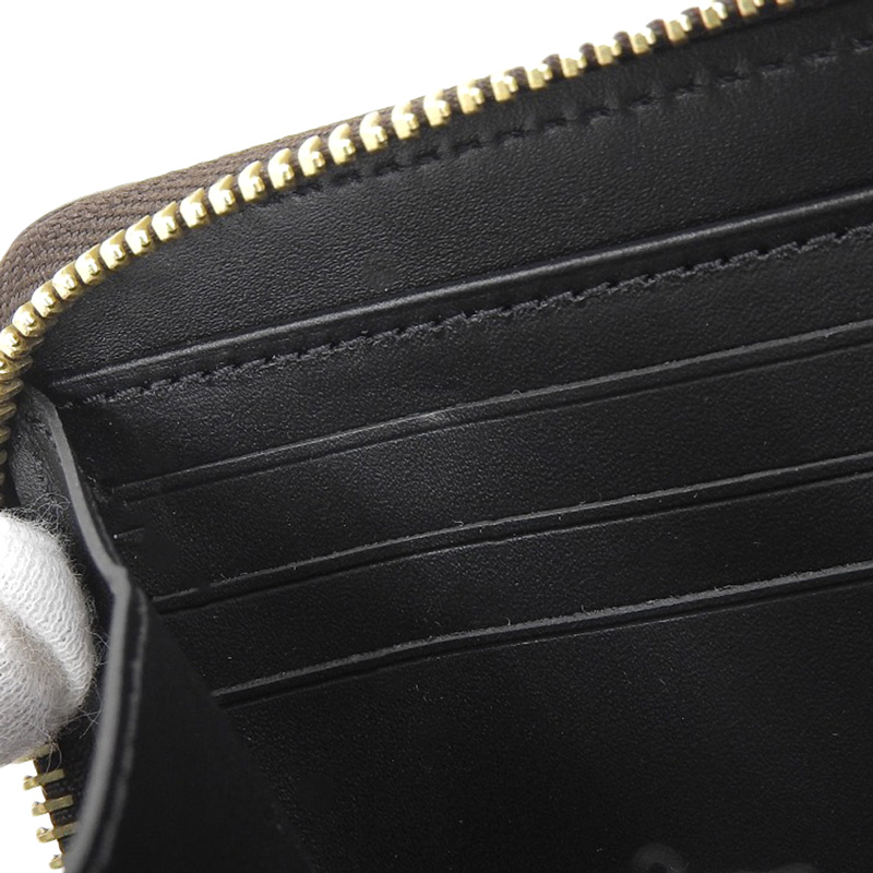 http://ルイヴィトン%20LOUIS%20VUITTON%20トランスフォームドモノグラム%20トランクタイム%20ジッピーウォレット%20長財布%20M52746%20中古%20LV1583