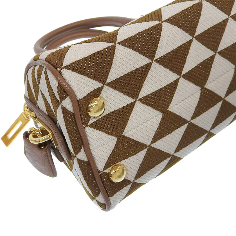http://プラダ%20PRADA%20シンボル%20エンブロイダリー%20トップハンドルバッグ%202WAY%20ファブリック/レザー%20ブラウン/ホワイト%201BB846%20美品%20OB1976