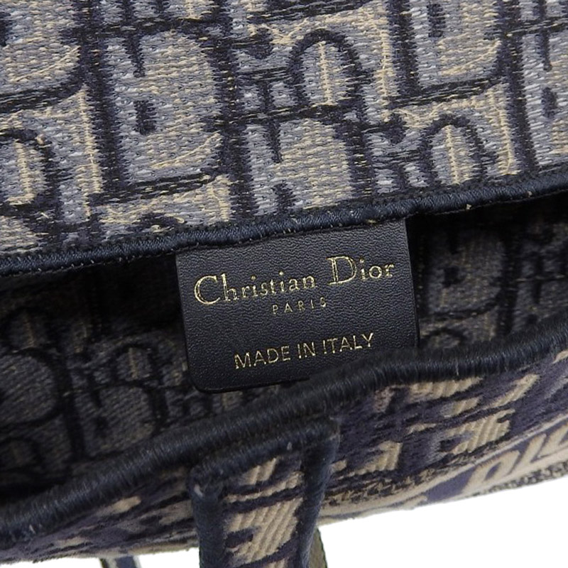 http://ディオール%20CHRISTIAN%20DIOR%20オブリーグ%20サドル%20スリムポーチ%20バッグ%20エンブロイダリー%20キャンバス%20ネイビー%20S5647CRIW%20中古%20OB1979