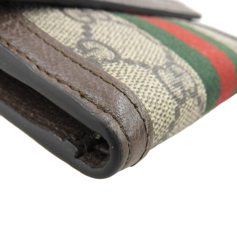 http://グッチ%20GUCCI%20オフィディア%20GGフレンチフラップウォレット%20二つ折り財布%20GGスプリーム%20ベージュ/エボニー%20523173%20中古%20GU0602