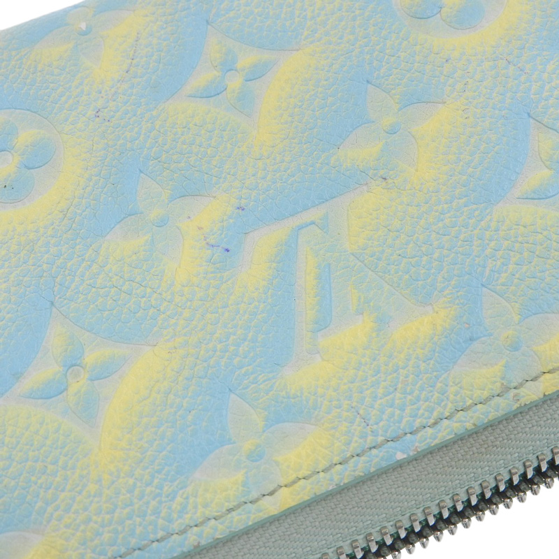 http://ルイヴィトン%20LOUIS%20VUITTON%20モノグラム・アンプラント%20ジッピー・ウォレット%20ヴェール・ドー%20ブルー%20イエロー%20M81466%20中古%20LV1599
