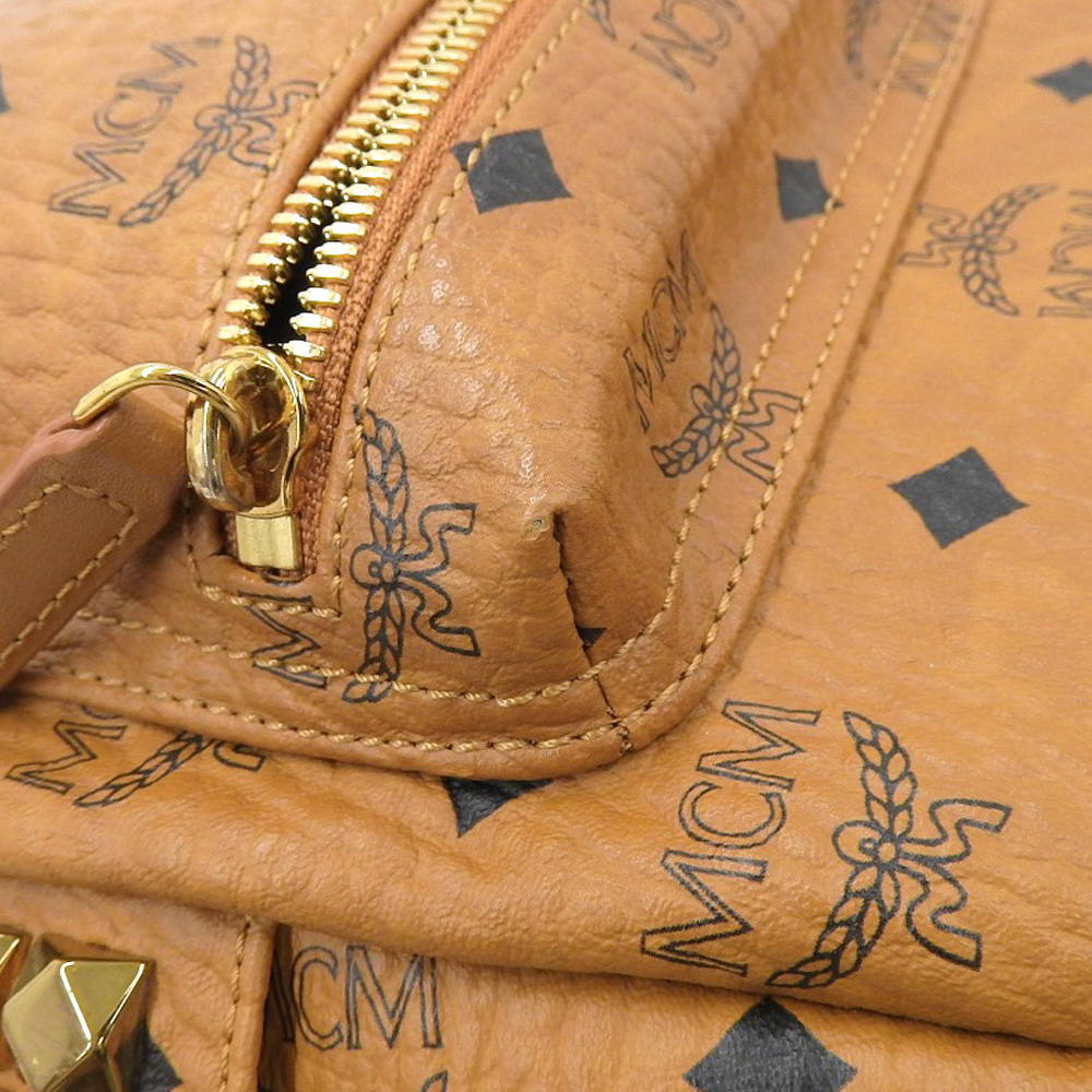 http://エムシーエム%20MCM%20バックパック%20リュックサック%20スタッズ%20レザー%20ブラウン%20中古%20OB2080