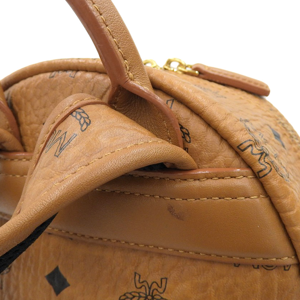 http://エムシーエム%20MCM%20バックパック%20リュックサック%20スタッズ%20レザー%20ブラウン%20中古%20OB2080