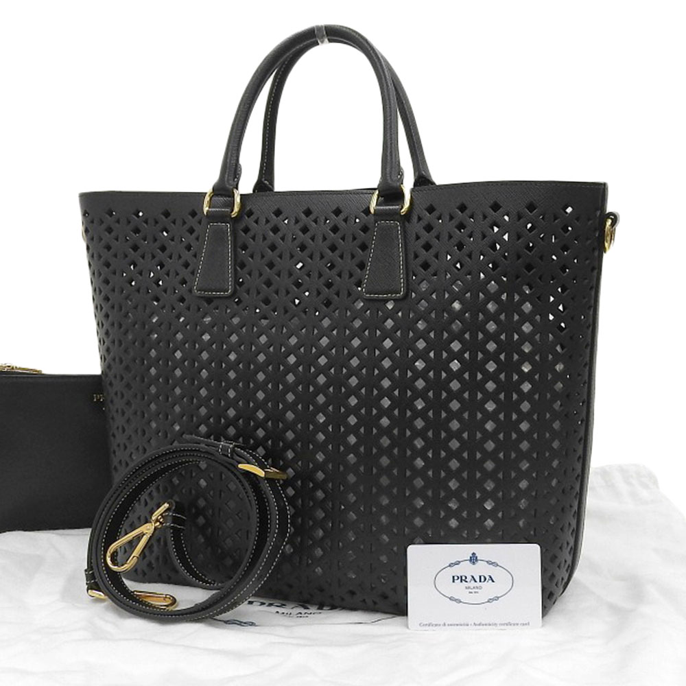 http://プラダ%20PRADA%202WAYバッグ%20トートバッグ%20ショルダーバッグ%20パンチング%20サフィアーノ%20レザー%20ブラック%20BR5016%20中古%20OB2089
