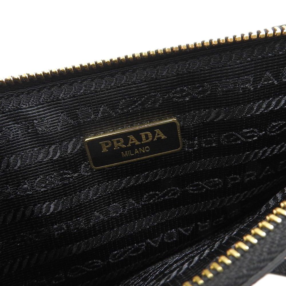 http://プラダ%20PRADA%202WAYバッグ%20トートバッグ%20ショルダーバッグ%20パンチング%20サフィアーノ%20レザー%20ブラック%20BR5016%20中古%20OB2089