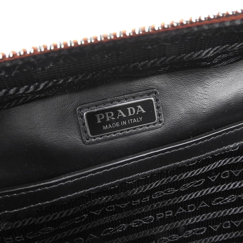 http://プラダ%20PRADA%20ブリック%202WAYバッグ%20ハンドバッグ%20ショルダーバッグ%20サフィアーノレザー%20オレンジ%202VH069%20中古%20OB2140