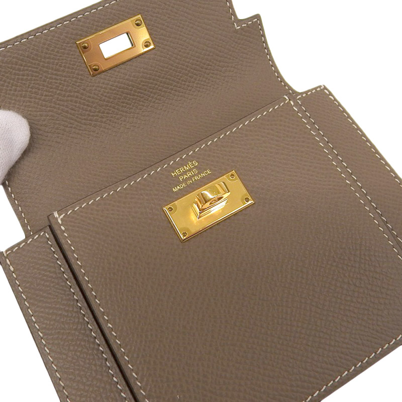 http://エルメス%20HERMES%20ケリーポケット%20コンパクト%20コインケース%20エプソン%20エトゥープ%20D刻印%202019年%20美品%20HE1103