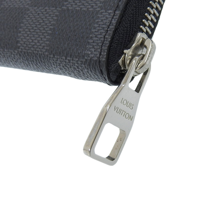 http://ルイヴィトン%20LOUIS%20VUITTON%20ダミエ・グラフィット%20ジッピーウォレット・ヴェルティカル%20長財布%20N63095%20中古%20LV1648