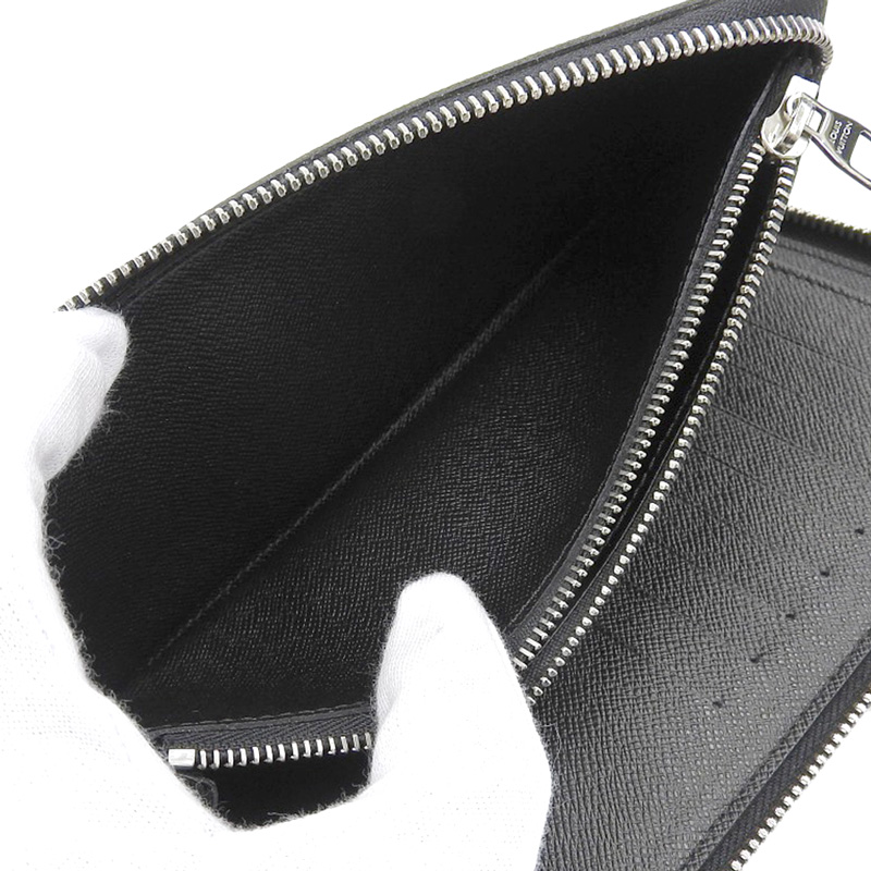 http://ルイヴィトン%20LOUIS%20VUITTON%20ダミエ・グラフィット%20ジッピーウォレット・ヴェルティカル%20長財布%20N63095%20中古%20LV1648