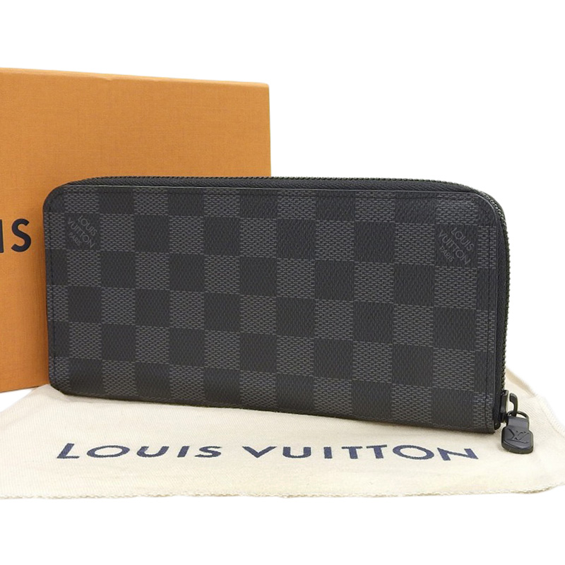 http://ルイヴィトン%20LOUIS%20VUITTON%20ダミエグラフィット%20ユーティリティ・ジッピーウォレット・ヴェルティカル%20長財布%20N60355%20中古%20LV1650
