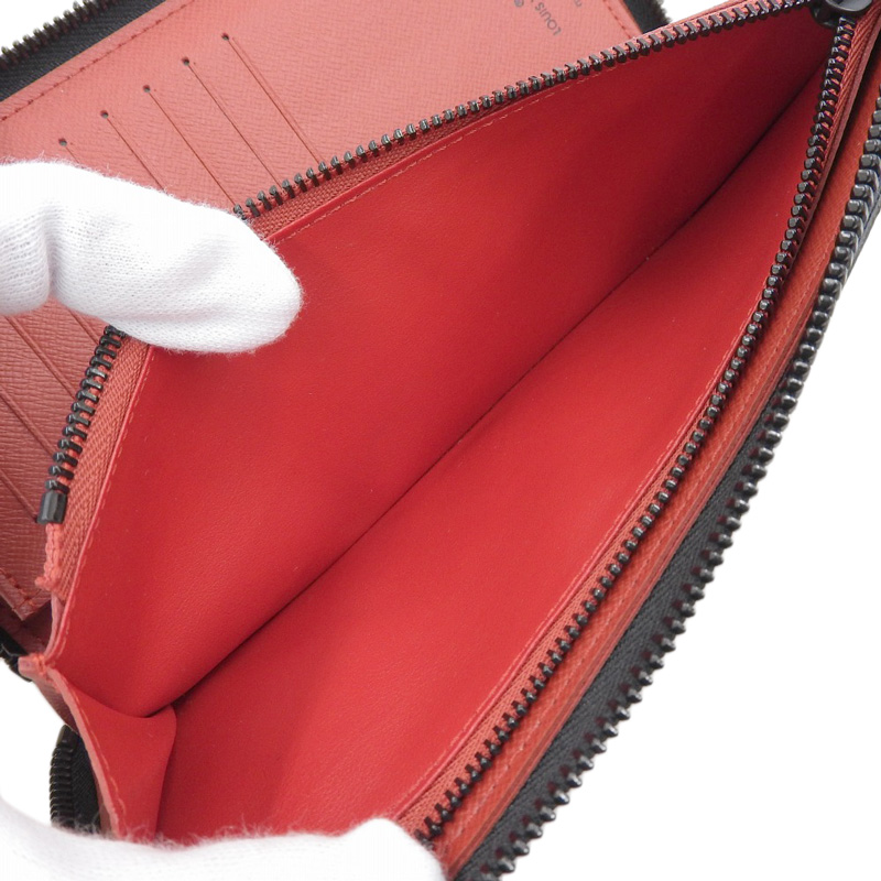 http://ルイヴィトン%20LOUIS%20VUITTON%20ダミエグラフィット%20ユーティリティ・ジッピーウォレット・ヴェルティカル%20長財布%20N60355%20中古%20LV1650