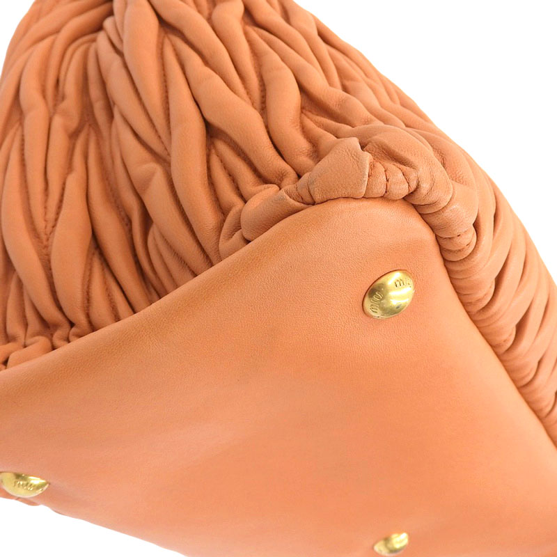 http://ミュウミュウ%20MIUMIU%20マテラッセ%202WAYバッグ%20ハンドバッグ%20ショルダーバッグ%20レザー%20オレンジ%20RN941M%20中古%20OB2219