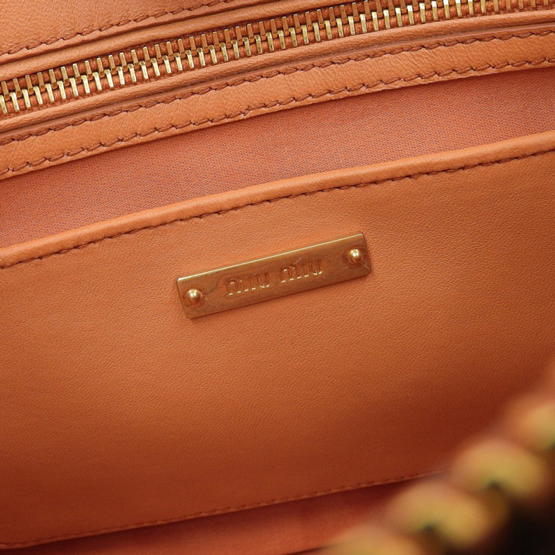 http://ミュウミュウ%20MIUMIU%20マテラッセ%202WAYバッグ%20ハンドバッグ%20ショルダーバッグ%20レザー%20オレンジ%20RN941M%20中古%20OB2219