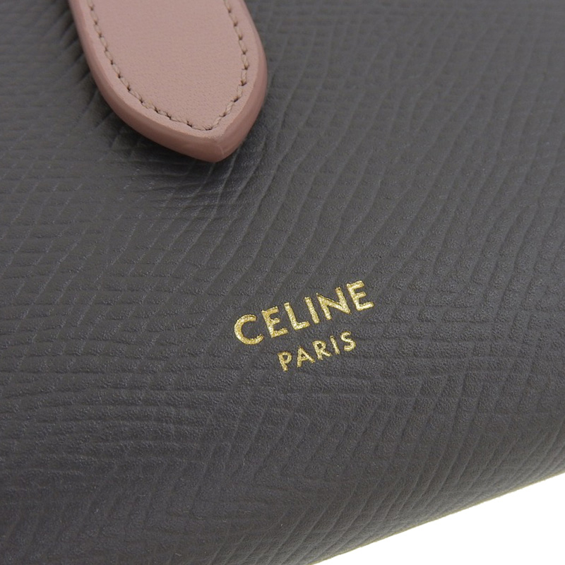 http://セリーヌ%20CELINE%20ストラップウォレット%20二つ折り財布%20レザー%20グレー/ピンク%20中古%20OBB0569