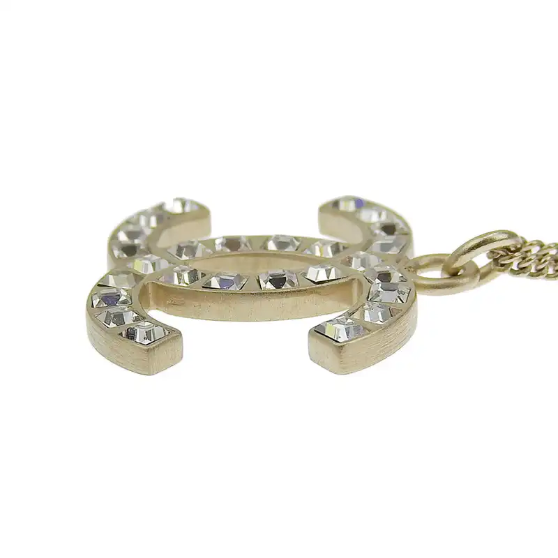 http://シャネル%20CHANEL%20ココマーク%20ネックレス%20GP%20ラインストーン%20ゴールド色%20B12A%20中古%20CH0975
