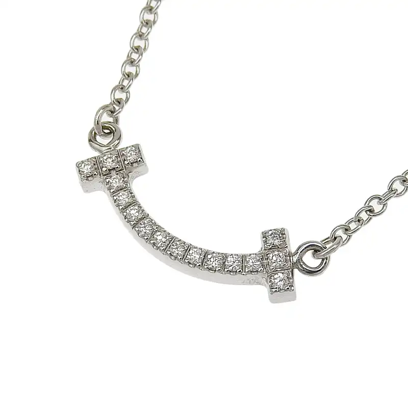 http://ティファニー%20TIFFANY%20&%20Co.%20Tスマイルネックレス%20ミニ%20ダイヤモンド%20K18WG%20中古%20TI0142
