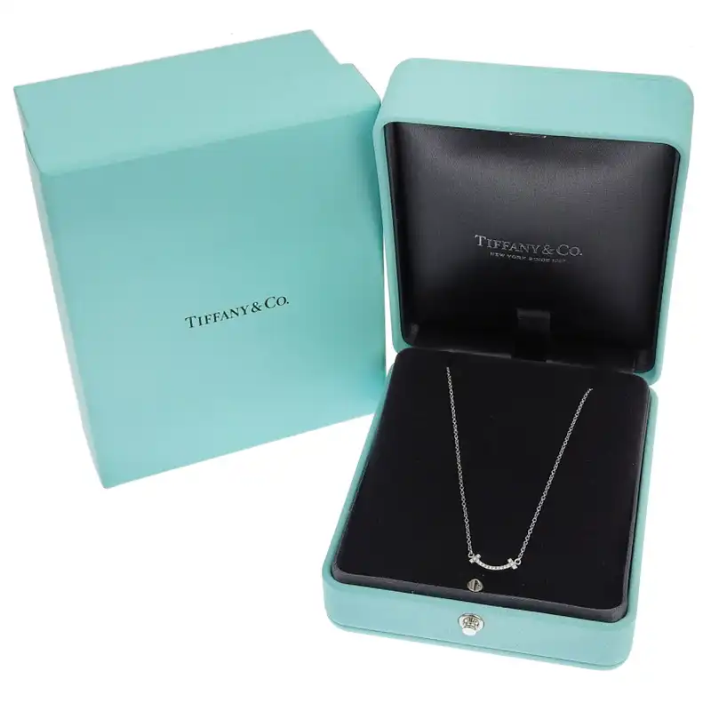 http://ティファニー%20TIFFANY%20&%20Co.%20Tスマイルネックレス%20ミニ%20ダイヤモンド%20K18WG%20中古%20TI0142