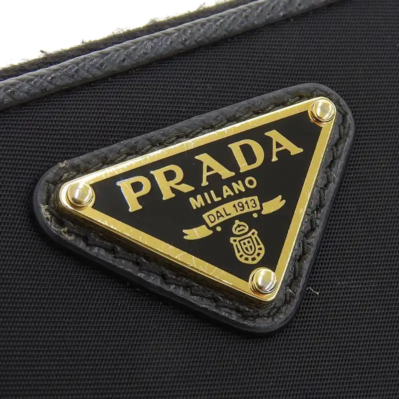 http://プラダ%20PRADA%20ラウンドファスナー%20長財布%20ナイロン/レザー%20ブラック%20中古%20OBB0581