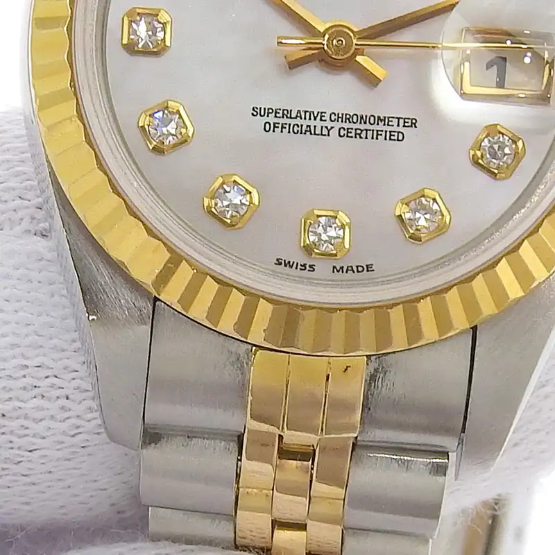 http://ロレックス%20ROLEX%20デイトジャスト%20レディース%20自動巻き%20腕時計%20SS/YG%2010Pダイヤ%20シェル文字盤%20U番%201997年%2069173NG%20中古%20RO0289