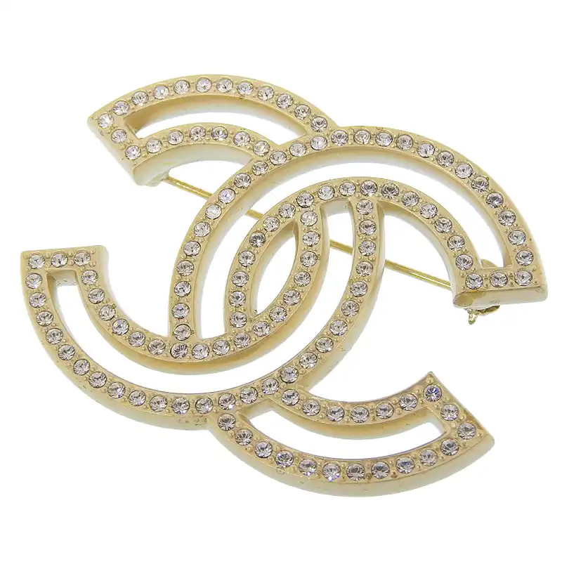http://シャネル%20CHANEL%20ココマーク%20ブローチ%20ラインストーン%20ゴールド色%20A20V%20中古%20CH1003