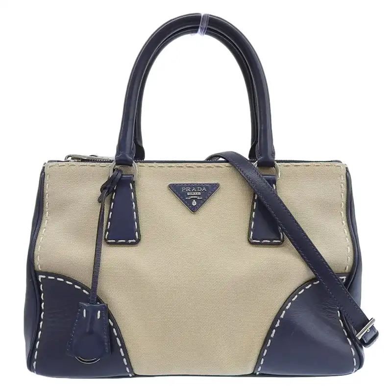 http://プラダ%20PRADA%202WAYバッグ%20ハンドバッグ%20ショルダーバッグ%20キャンバス%20レザー%20ベージュ%20ネイビー%20中古%20OB2423